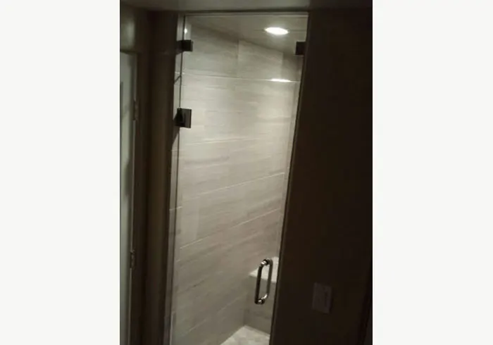 Hinged Shower Door Installation with Operable Transom in Alpine